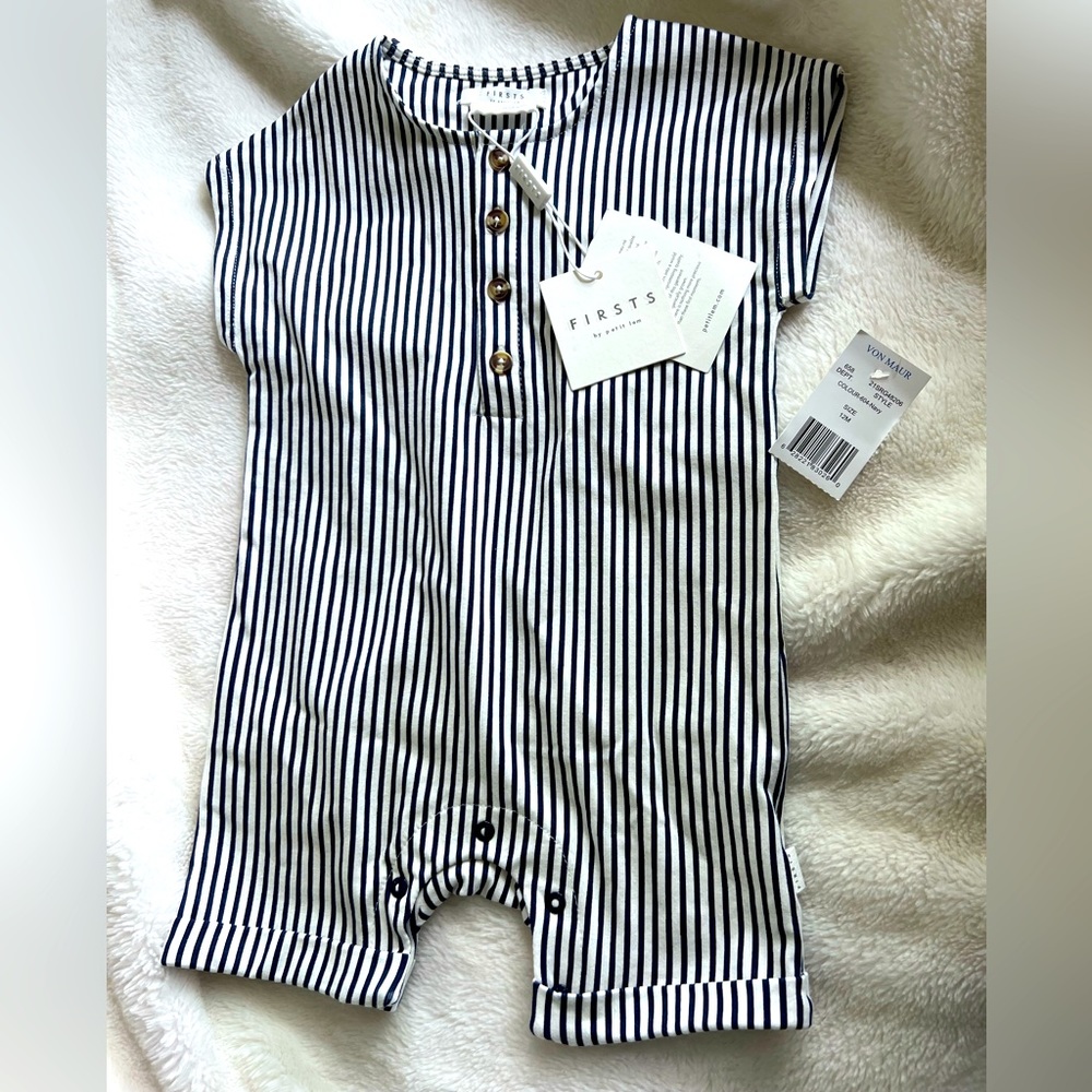 New First baby romper. Very soft and silky!